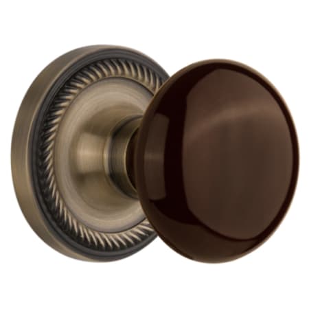 Nostalgic Warehouse Brown Porcelain Solid Brass Single Dummy Door Knob with Rope Rose Antique Brass