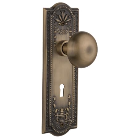 Nostalgic Warehouse New York Solid Brass Passage Door Knob Set with Meadows Rose, Keyhole and 2-3/4" Backset Antique Brass