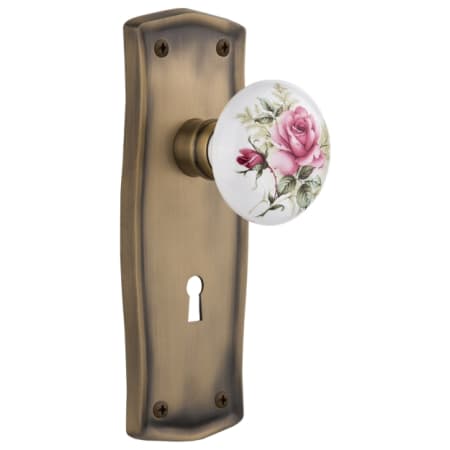 Nostalgic Warehouse Vintage Farmhouse Painted Rose Vintage Skeleton Key Retrofit Entry Handleset Trim with Solid Brass Prairie Country Backplate, Keyhole and 2-1/4" Backset Antique Brass