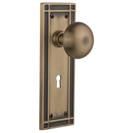 Nostalgic Warehouse New York Solid Brass Passage Door Knob Set with Mission Rose, Keyhole and 2-3/4" Backset Antique Brass