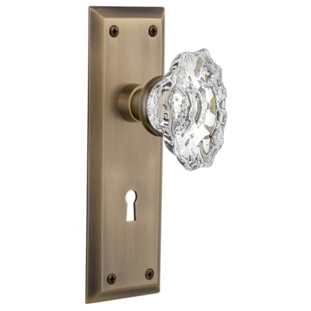 Nostalgic Warehouse Chateau Solid Brass Passage Door Knob Set with New York Rose, Keyhole and 2-3/4" Backset Antique Brass