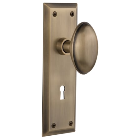 Nostalgic Warehouse Homestead Solid Brass Passage Door Knob Set with New York Rose, Keyhole and 2-3/4" Backset Antique Brass
