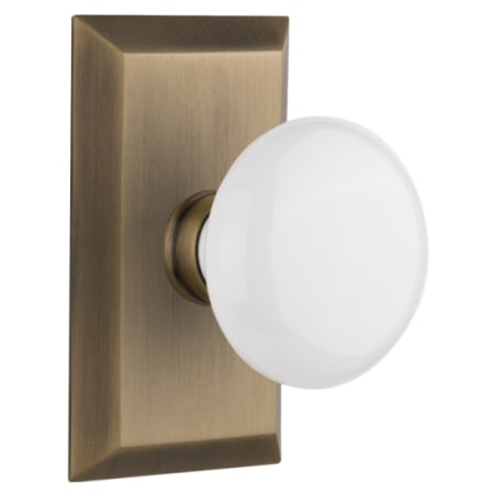 Nostalgic Warehouse White Porcelain Solid Brass Single Dummy Door Knob with Studio Rose Antique Brass