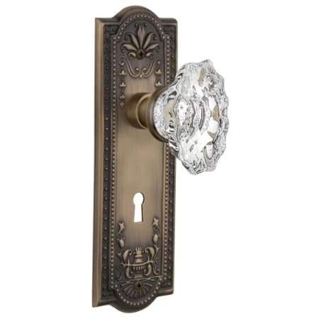 Nostalgic Warehouse Vintage Chateau Fluted Crystal Single Dummy Door Knob with Solid Brass Meadows Botanical Back Plate and Keyhole Antique Brass
