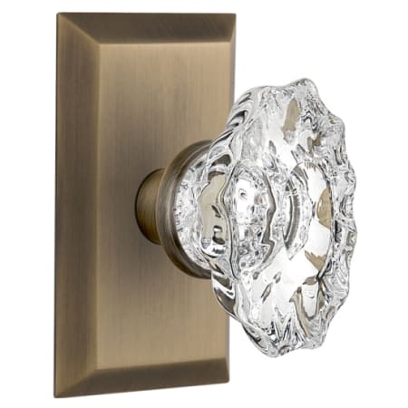 Nostalgic Warehouse Chateau Solid Brass Privacy Door Knob Set with Studio Rose and 2-3/8" Backset Antique Brass