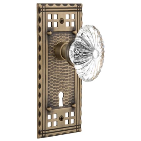 Nostalgic Warehouse Vintage Farmhouse Oval Egg Fluted Lead-Free Crystal Flower Passage Door Knob Set with Long Craftsman Plate, Keyhole and 2-3/8" Backset Antique Brass