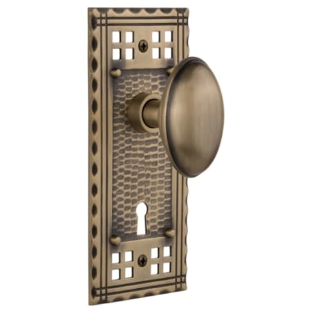 Nostalgic Warehouse Farmhouse Homestead Solid Brass Single Dummy Door Knob with Long Craftsman Plate and Keyhole Antique Brass