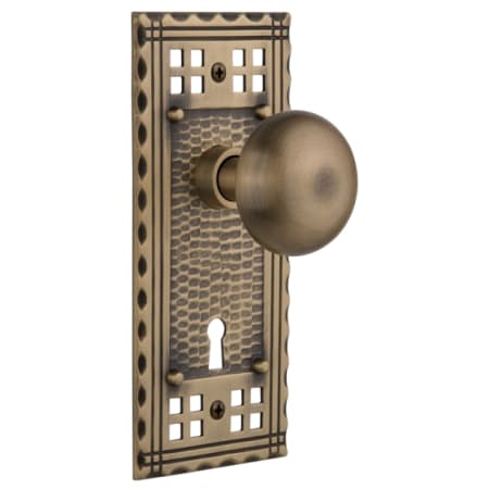 Nostalgic Warehouse New York Solid Brass Privacy Door Knob Set with Long Craftsman Plate, Keyhole and 2-3/8" Backset Antique Brass