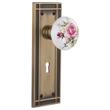 Nostalgic Warehouse Rose Porcelain Solid Brass Vintage Skeleton Key Retrofit Entry Handleset Trim with Mission Rose, Keyhole and 2-3/8" Backset Antique Brass