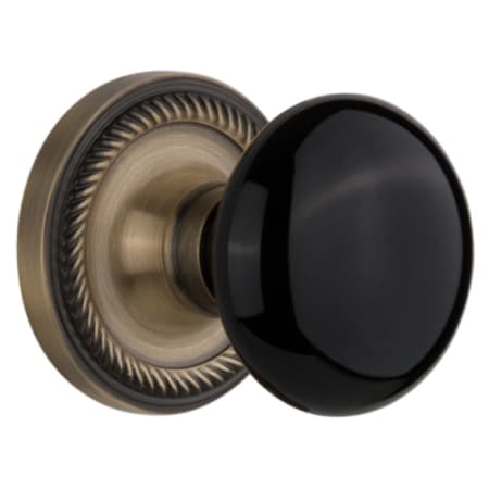 Nostalgic Warehouse Black Porcelain Solid Brass Privacy Door Knob Set with Rope Rose and 2-3/4" Backset Antique Brass