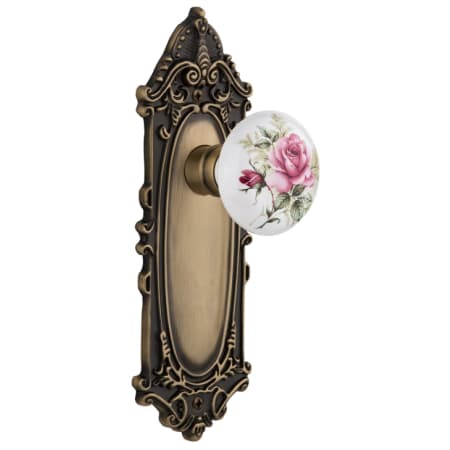 Nostalgic Warehouse Rose Porcelain Solid Brass Privacy Door Knob Set with Victorian Rose and 2-3/4" Backset Antique Brass