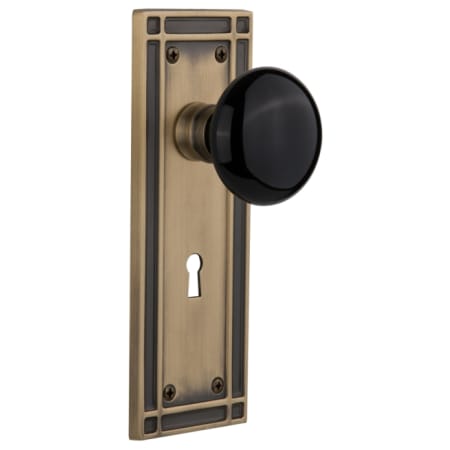 Nostalgic Warehouse Vintage Black Porcelain Privacy Door Knob Set with Solid Brass Mission Style Backplate, Keyhole and 2-3/4" Backset Antique Brass