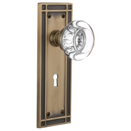 Nostalgic Warehouse Round Clear Crystal Solid Brass Privacy Door Knob Set with Mission Rose, Keyhole and 2-3/4" Backset Antique Brass