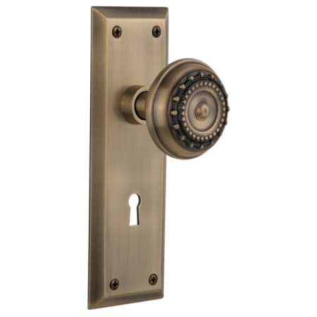 Nostalgic Warehouse Meadows Solid Brass Privacy Door Knob Set with New York Rose, Keyhole and 2-3/4" Backset Antique Brass