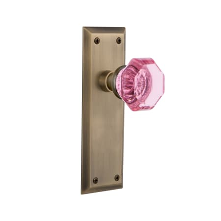 Nostalgic Warehouse New York Solid Brass Rose Passage Door Knob Set with Pink Waldorf Knob for 2-3/4" Backset Antique Brass