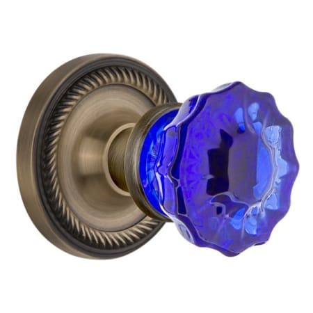Nostalgic Warehouse Rope Solid Brass Rose Passage Door Knob Set with Cobalt Crystal Knob and 2-3/8" Backset Antique Brass