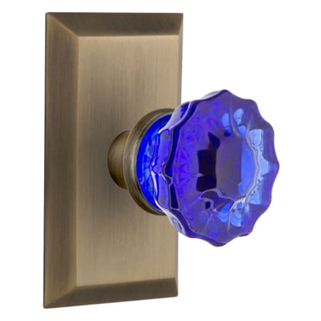 Nostalgic Warehouse Studio Solid Brass Rose Passage Door Knob Set with Cobalt Crystal Knob and 2-3/8" Backset Antique Brass