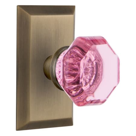 Nostalgic Warehouse Studio Solid Brass Rose Passage Door Knob Set with Pink Waldorf Knob and 2-3/8" Backset Antique Brass