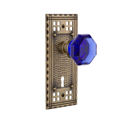 Nostalgic Warehouse Craftsman Solid Brass Rose Single Dummy Door Knob with Cobalt Waldorf Knob and Keyhole Antique Brass