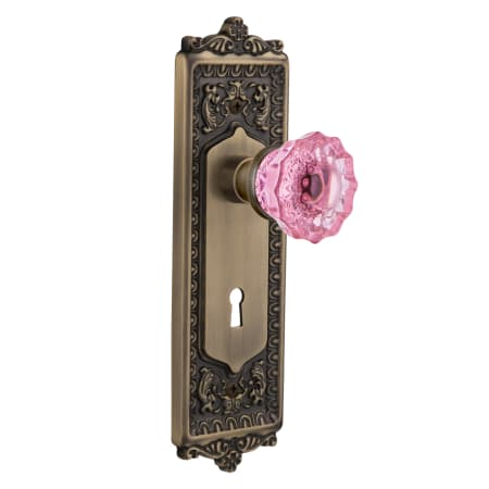 Nostalgic Warehouse Egg and Dart Solid Brass Single Dummy Door Knob with Pink Crystal Knob and Decorative Keyhole Antique Brass