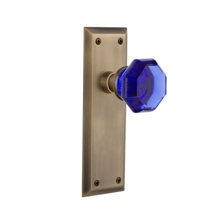 Nostalgic Warehouse New York Solid Brass Rose Dummy Door Knob Set With Cobalt Waldorf Knob Antique Brass