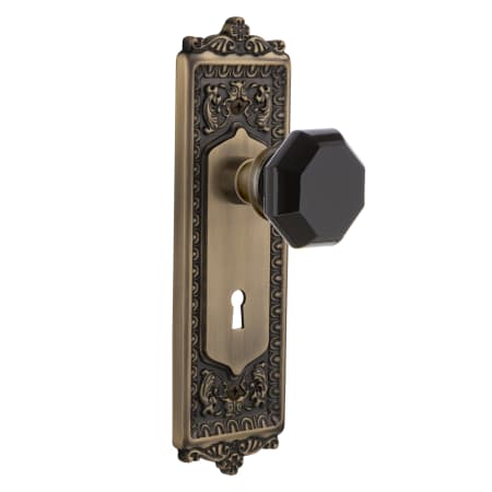 Nostalgic Warehouse Egg and Dart Solid Brass Rose Dummy Door Knob Set with Black Waldorf Knob and Decorative Keyhole Antique Brass