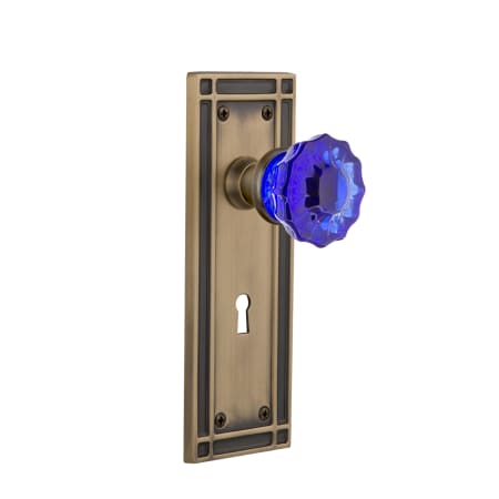 Nostalgic Warehouse Mission Solid Brass Rose Privacy Door Knob Set with Cobalt Crystal Knob and Decorative Keyhole for 2-3/4" Backset Antique Brass