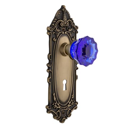 Nostalgic Warehouse Victorian Rose Privacy Door Knob Set with Cobalt Crystal Knob and Decorative Skeleton Keyhole for 2-3/8" Backset Antique Brass