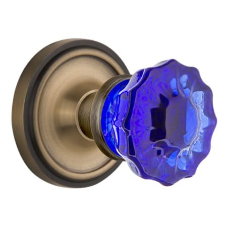 Nostalgic Warehouse Classic Solid Brass Rose Vintage Retrofit Entry Door Knob Set with Cobalt Crystal Knob and Skeleton Keyhole Antique Brass