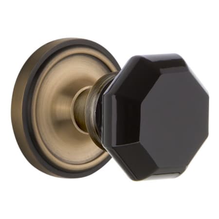 Nostalgic Warehouse Classic Solid Brass Rose Vintage Retrofit Entry Door Knob Set with Black Waldorf Knob and Skeleton Keyhole Antique Brass