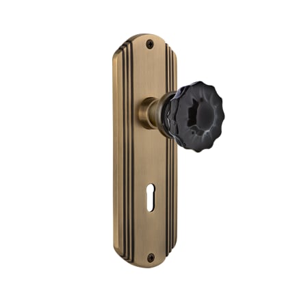 Nostalgic Warehouse Deco Solid Brass Rose Passage Door Knob Set with Black Crystal Knob and Decorative Keyhole for 2-3/8" Backset Antique Brass