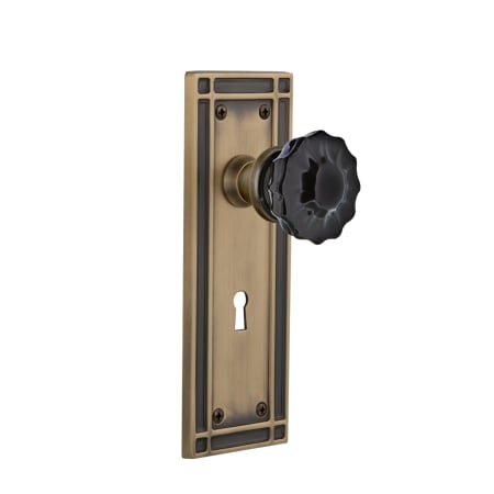 Nostalgic Warehouse Mission Solid Brass Rose Privacy Door Knob Set with Black Crystal Knob and Decorative Keyhole for 2-3/8" Backset Antique Brass
