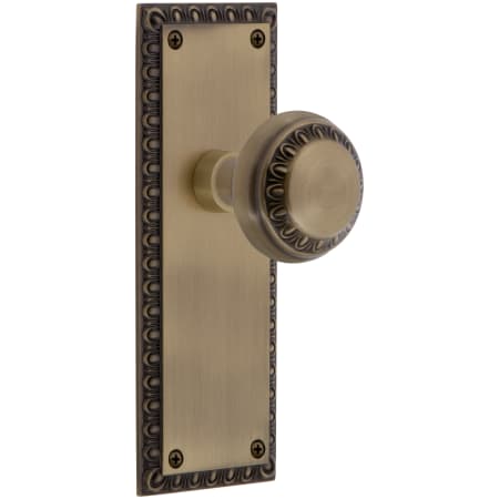 Nostalgic Warehouse Solid Brass Neoclassical Non-Turning One-Sided Dummy Door Knob with Neoclassical Rose Antique Brass