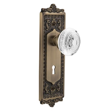 Nostalgic Warehouse Vintage Crystal Egg and Dart Passage Door Knob Set with Egg & Dart Rose, 2-3/8" Backset and Decorative Keyhole Antique Brass