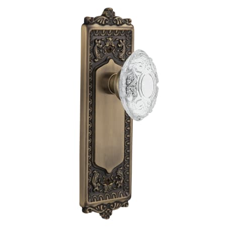 Nostalgic Warehouse Vintage Crystal Victorian Passage Door Knob Set with Egg & Dart Rose and 2-3/8" Backset Antique Brass