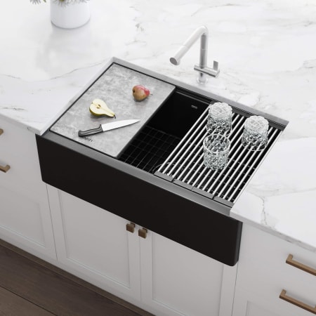 Ruvati epiCast 33" Farmhouse Single Basin Granite Composite Kitchen Sink with Basin Rack, Basket Strainer and Cutting Board Black