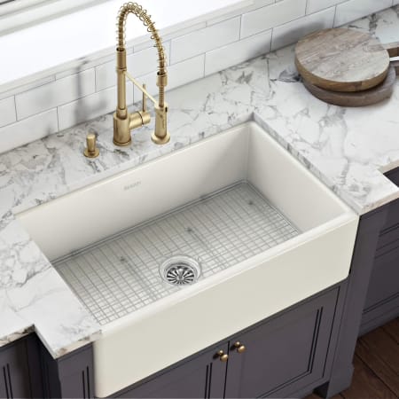 Ruvati Fiamma 33" Farmhouse Single Basin Fireclay Kitchen Sink with Basin Rack and Basket Strainer Biscuit