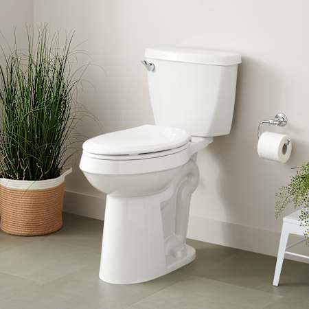 Signature Hardware Bradenton Two-Piece Elongated Toilet with 10" Rough-In - 19" Bowl Height  - Left Hand Lever Brushed Gold