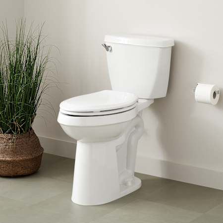 Signature Hardware Bradenton Two-Piece Elongated Toilet with 12" Rough-In - 19" Bowl Height - Left Hand Lever Brushed Gold