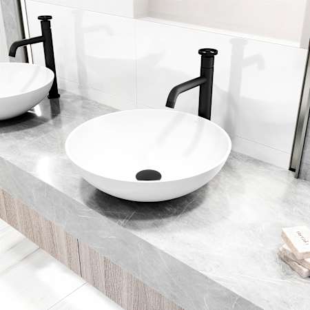 Vigo Lotus 16" Circular Stone Composite Vessel Bathroom Sink with 1.2 GPM 12" Deck Mounted Bathroom Faucet and Pop-Up Drain Assembly Matte Black
