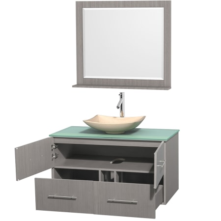 Open Vanity View with Green Glass Top, Vessel Sink, and 36" Mirror