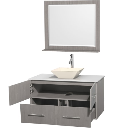 Open Vanity View with White Stone Top, Vessel Sink, and 36" Mirror