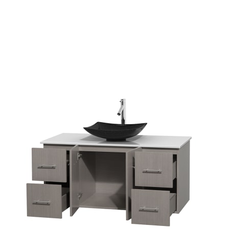 Open Vanity View with White Stone Top and Vessel Sink