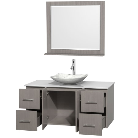 Open Vanity View with White Stone Top, Vessel Sink, and 36" Mirror