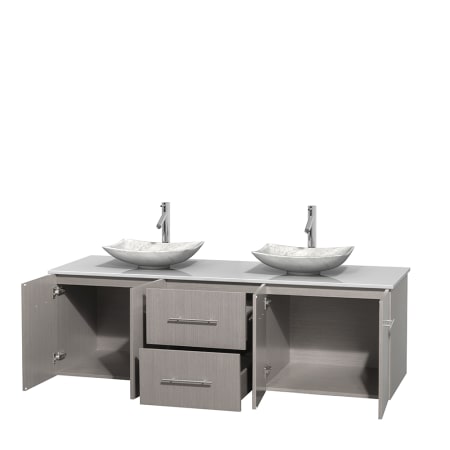 Open Vanity View with White Stone Top and Vessel Sinks