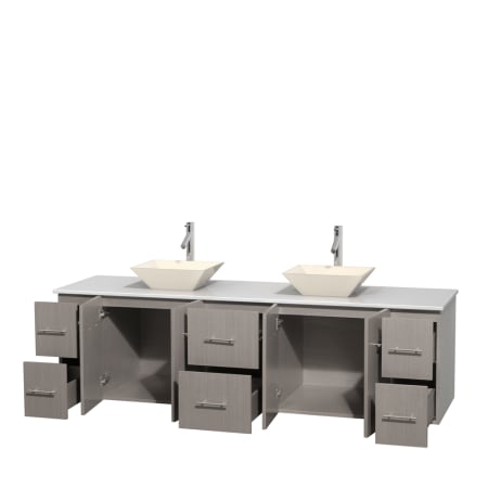 Open Vanity View with White Stone Top and Vessel Sinks