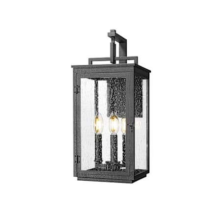 Z-Lite Hartwell 3 Light 19" Tall Outdoor Wall Sconce with Seedy Glass Panels Sand Black