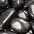Ackland Rivora Polished Quartzite Landscaping Weed Control Rock Pebbles, 1-2 in. - Sold by Pallet (27.5 CF/Pallet) Nero