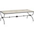 Currey and Company Agora 56" Wide Travertine and Wrought Iron Table Natural / Rustic Bronze