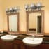 Three Light Bathroom Fixture Burnt Sienna Finish Room View